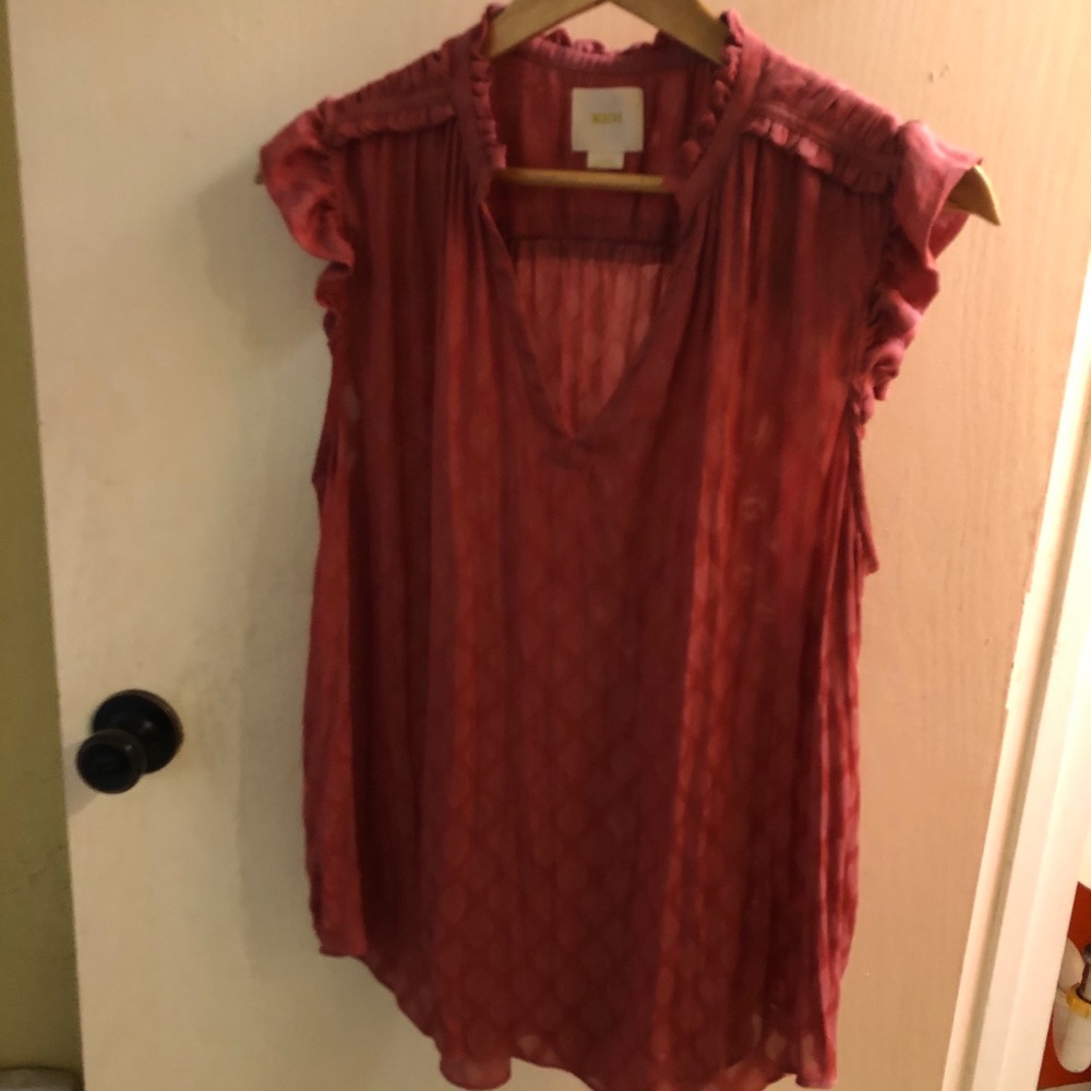 Airy ruffle tank.